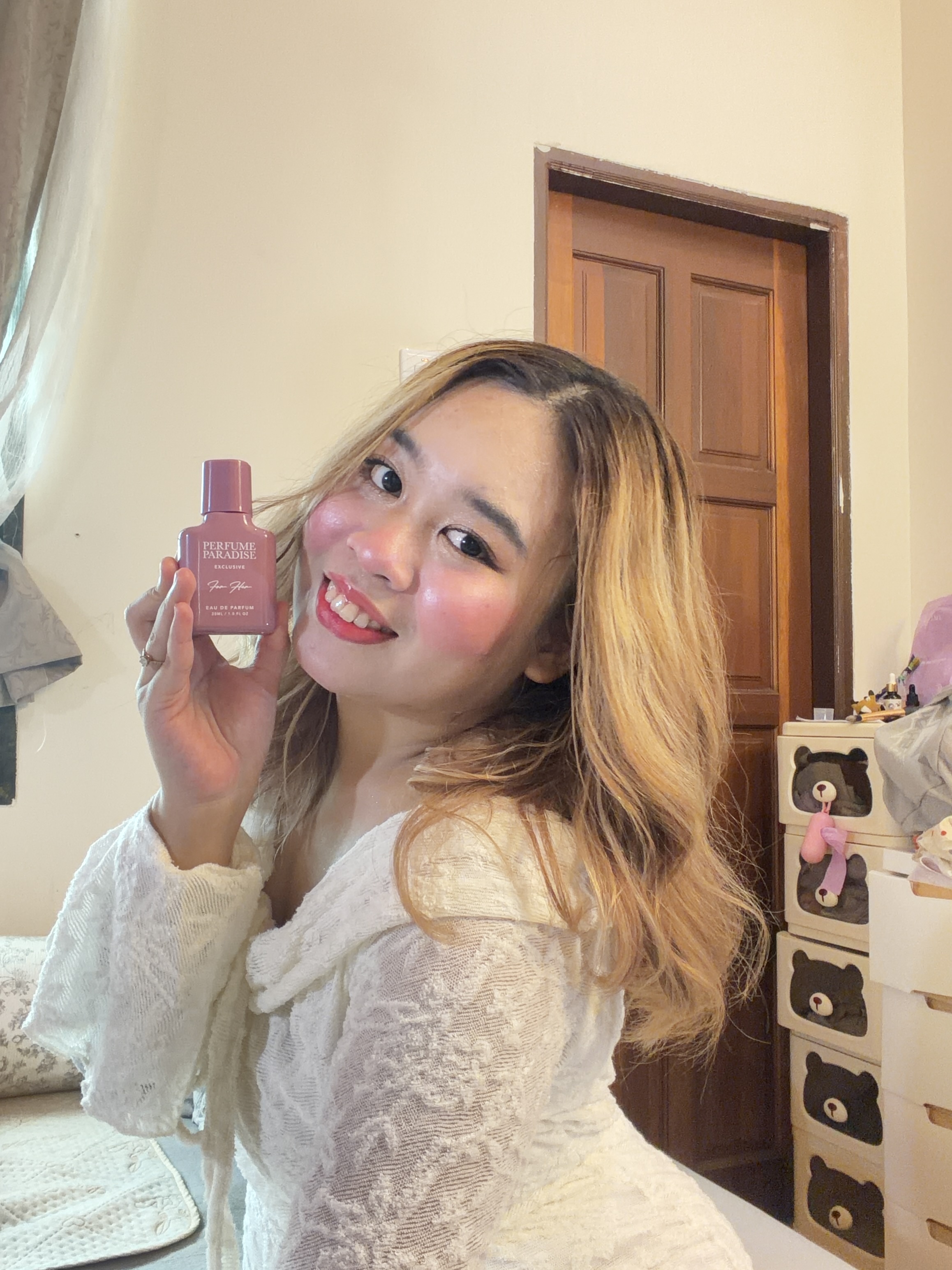 Perfume, held close